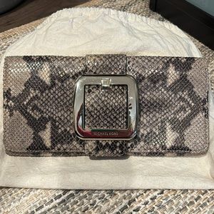 Michael Kors Clutch with dust bag.